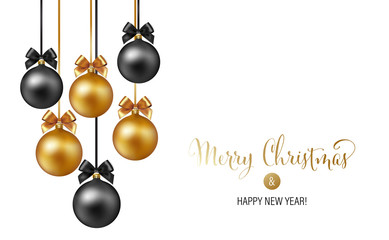 Christmas background with gold and black evening baubles