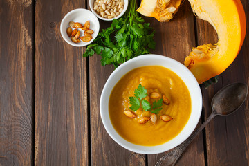 pumpkin soup on wooden surface