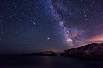 Milky Way and the Perseids / Long time exposure night landscape with planet Mars and Milky Way Galaxy during the Perseids flow above the Black sea, Bulgaria