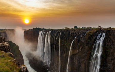 Victoria falls dreamy sunset panorama with orange