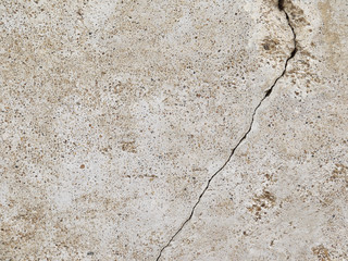 Grunge concrete cement wall with crack in industrial building, great for your design and texture background