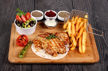 Chicken cooked with potatoes and spices
