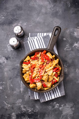 Pasta with chicken and pepper in tomato sauce