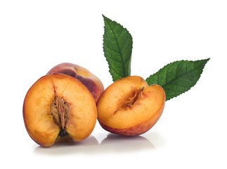 peach with leaf isolated on white