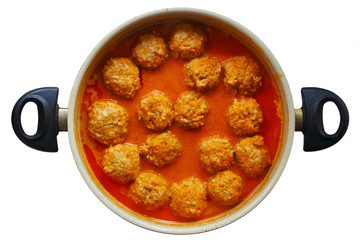 meat rice balls in tomato sauce in pan isolated on white background