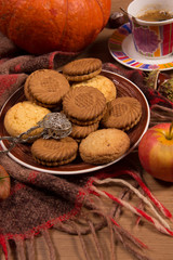 Autumn concept with pumpkin and a cup of coffee