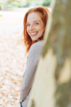 Cute charismatic young redhead woman