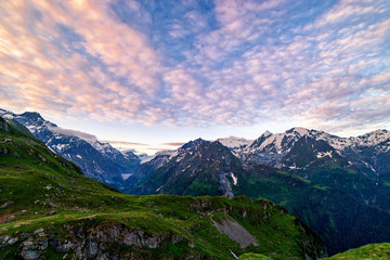 Obraz premium Scenic view of beautiful Swiss Alps mountains. Blue hour sunset with pink and blue tones, Verbier, Canton du Valais, Wallis, Switzerland.