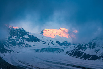 Obraz premium Scenic view of beautiful landscape of Swiss Alps with a majestic Glacier de Corbassiere, Switzerland.