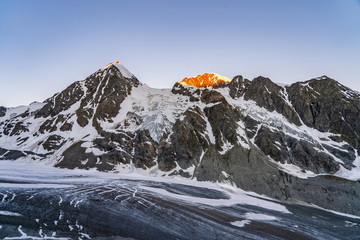 Obraz premium Scenic view of beautiful landscape of Swiss Alps with a majestic Glacier de Corbassiere in a view, Switzerland.