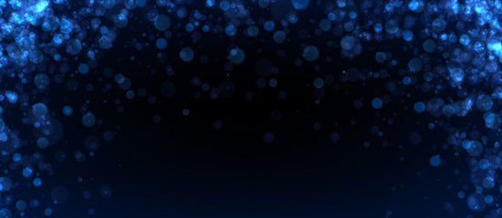 Obraz premium Blue abstract blurred background with bokeh effect.