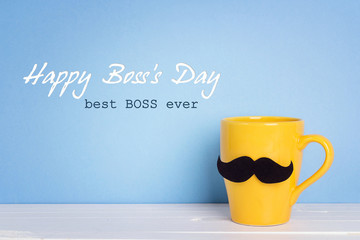 Boss day background with yellow mug with a mustache on blue.