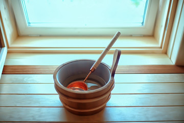 sauna accessories / spa concept, sauna relaxation, hot sauna accessories, steam, bucket, heat