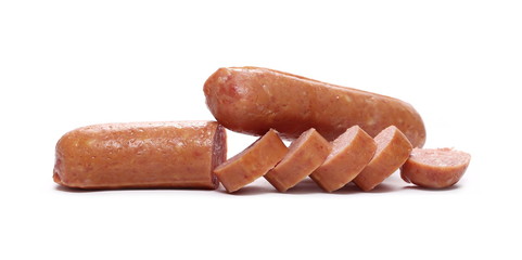 Sausages with slices isolated on white background