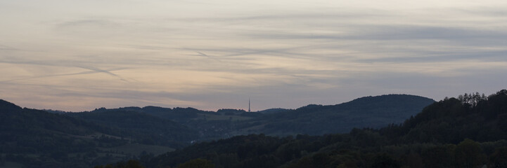 Landscape with a TV transmitter on top of a hill. Transmitter "Bukova hora".