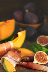 Cantaloupe melon sliced with Prosciutto. Italian appetizer