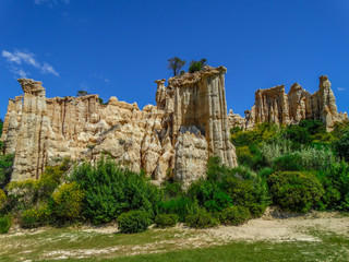 Orgues Ille sur Tet l limestone chimneys with sunlight and blue sky, Languedoc Roussillon, France