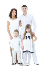 Fototapeta na wymiar Portrait of happy young family isolated on white