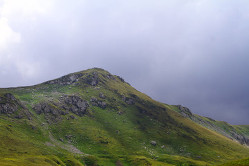 natural landscape photo of northern mountain landscape with heavy grey clouded sky