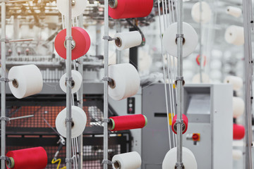 Knitted fabric. Textile factory in spinning production line and a rotating machinery and equipment production company.