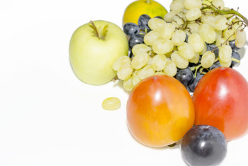 blue grapes and plum, green apples, red persimmons