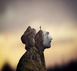 Double exposure of a man and mountain