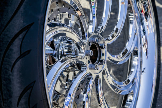Chromed car wheels with disc brakes, close-up