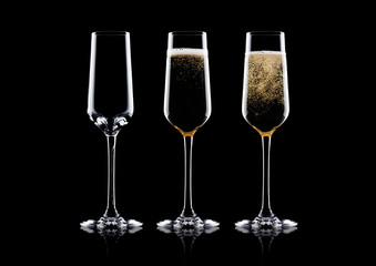 Elegant glasses of yellow champagne with bubbles