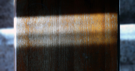 Light on the shabby wooden surface