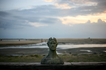 Concrete Sculpture of a man on the beach in Cox's Bazar Bangladesh