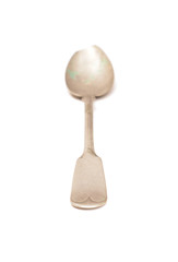 Old spoon on a white background