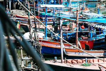 Fototapeta na wymiar Colorful fishing boats at harbor in Hua Hin Prachuap Khiri Khan Province, Thailand