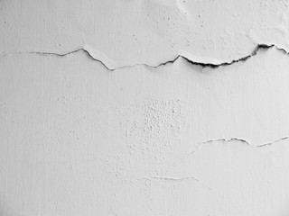 white wall with cracks