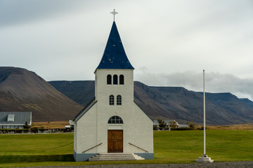 Fototapeta na wymiar White Icelandic church with blue tower roof
