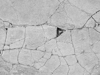 Cracked concrete floor texture closeup background
