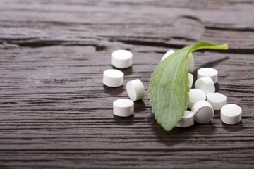 Natural sweetener in pills of stevia plant - Stevia rebaudiana.