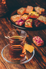 Tea in armudu glass with rahat lokum