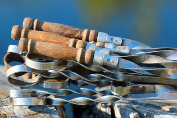Handles of old metal skewers