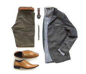 Men's casual outfits for man clothing with office shoes , watch, belt, trousers, shirt, gray suit and bracelet isolated on white background, Top view