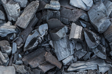 Black charcoal background texture copy space, close-up
