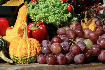 Picturesque small decoration in farm in Poland.  Vegetable with heathers composition. Autumn crops, harvest festival at the end of summer. Halloween.