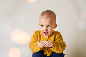 A portrait of a cute toddler boy.