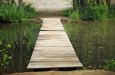 Wooden walkway on river