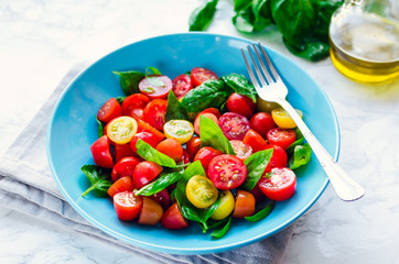 Tomatoes salad with basil