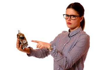 Junge Frau mit Wecker 
