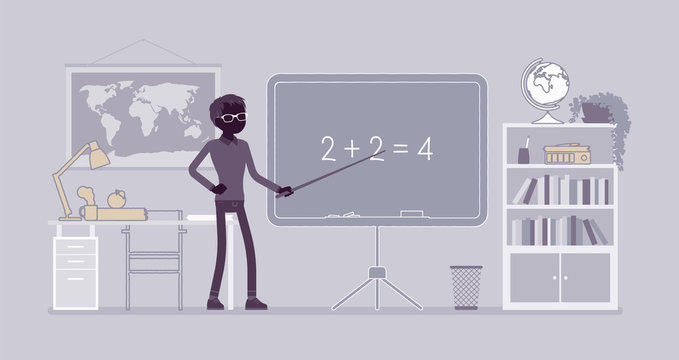 Male teacher stands at the blackboard