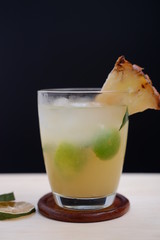 pineapple mojito cocktail on wood table