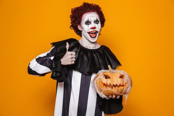 Angry man dressed in scary clown