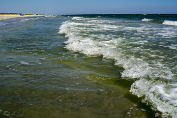 Wave on beach. Sandy seacoast. Ocean Water Background