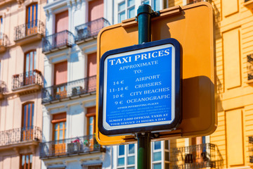 Fototapeta na wymiar Taxi Prices Sign in Downtown District of Valencia Spain